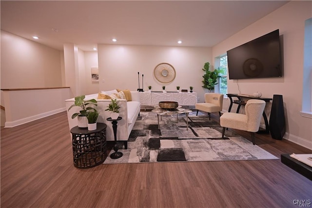 living room featuring dark hardwood / wood-style floors