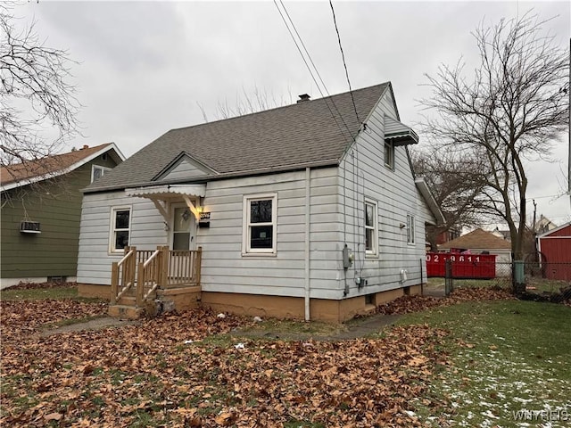 view of front of home with a front lawn