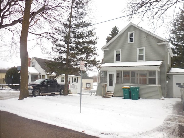 view of snow covered house