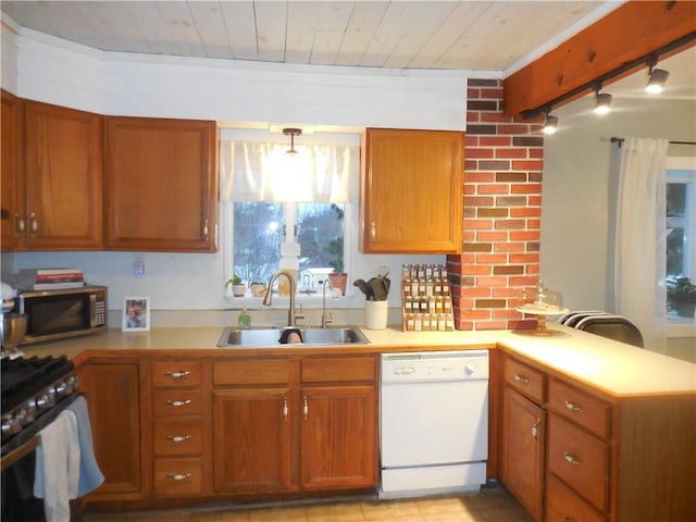 kitchen with rail lighting, stainless steel appliances, wooden ceiling, and sink