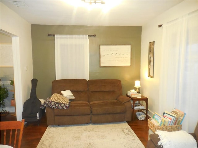 living room with dark wood-type flooring