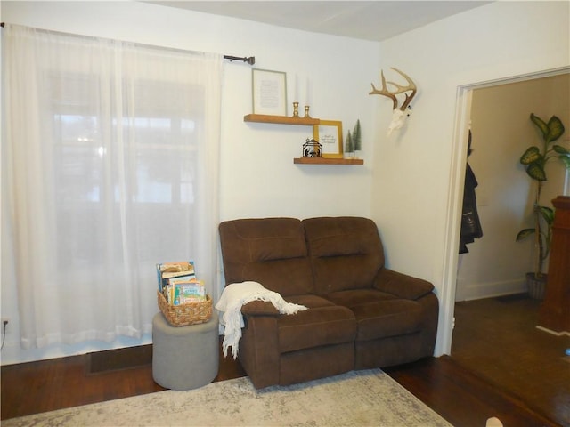 living room with dark wood-type flooring