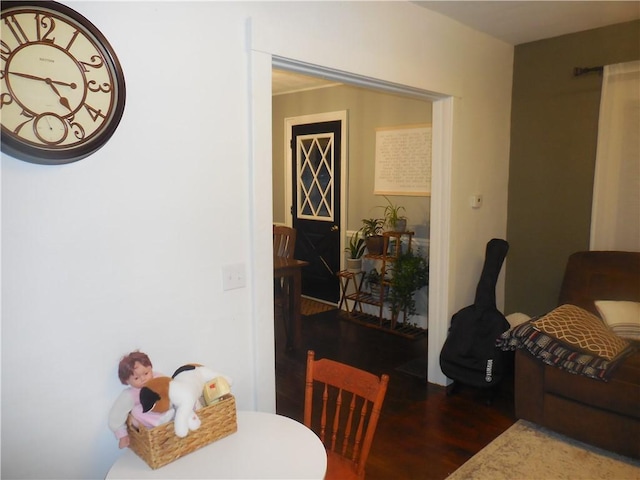 dining space featuring dark hardwood / wood-style flooring