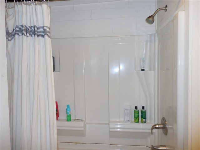 bathroom featuring shower / bath combination with curtain