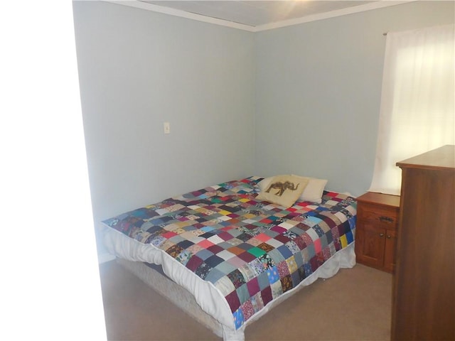 bedroom featuring light carpet and crown molding