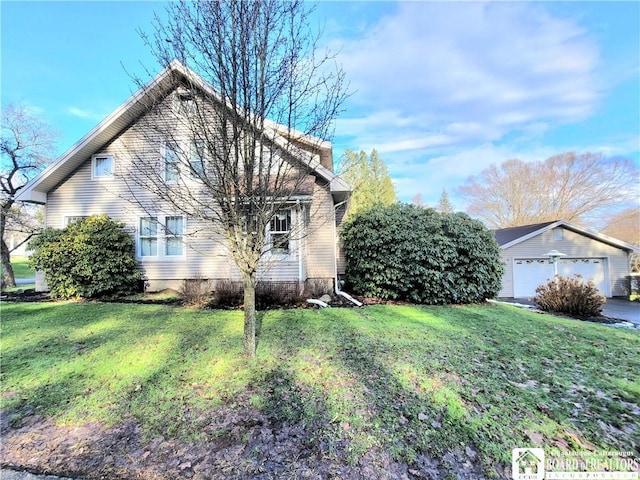 view of side of home featuring a yard