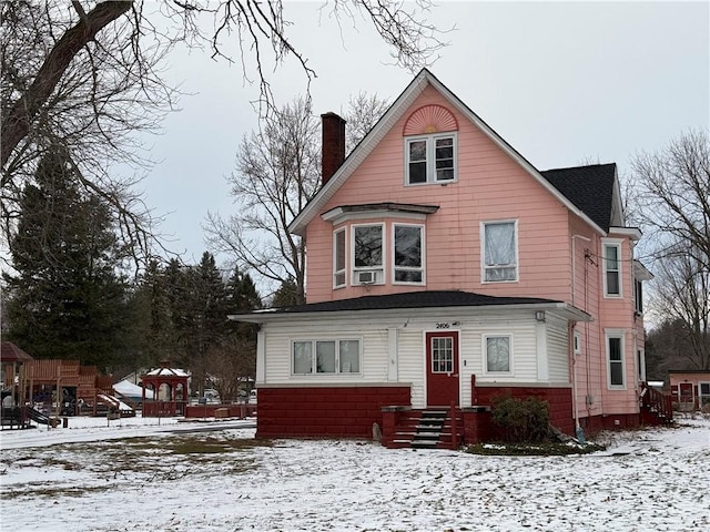 view of front of home featuring cooling unit