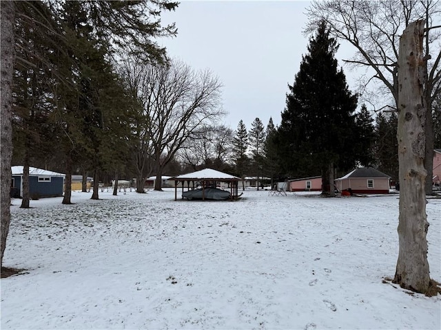 view of yard covered in snow