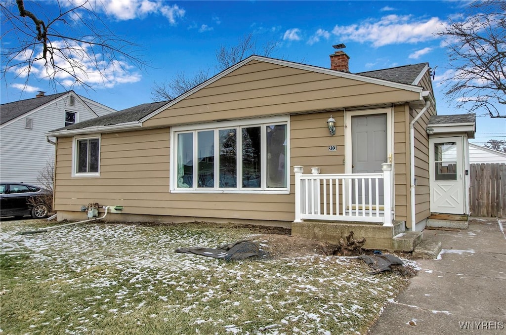 view of snow covered property