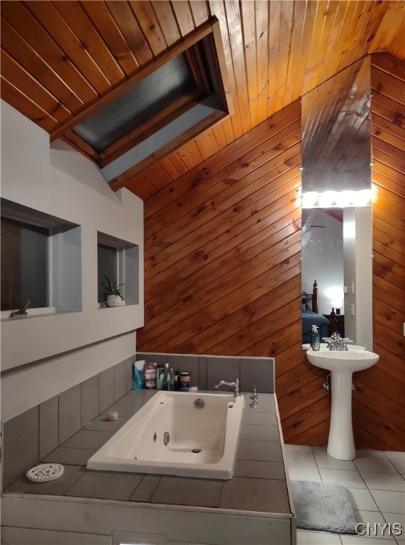 bathroom featuring lofted ceiling, tile patterned floors, a tub to relax in, wooden walls, and wooden ceiling