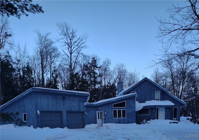 view of front of home with a garage