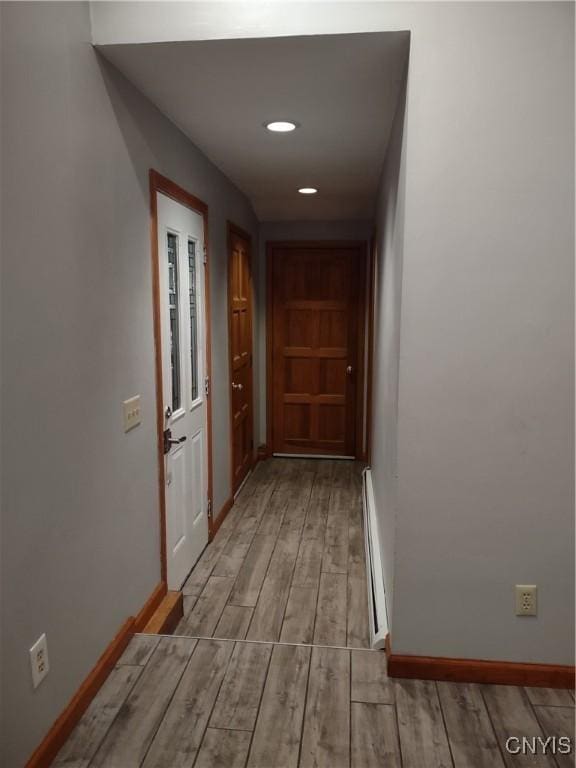 hallway with a baseboard radiator