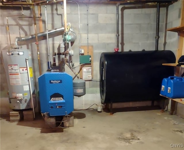 utility room featuring water heater