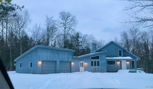 view of front of home with a garage