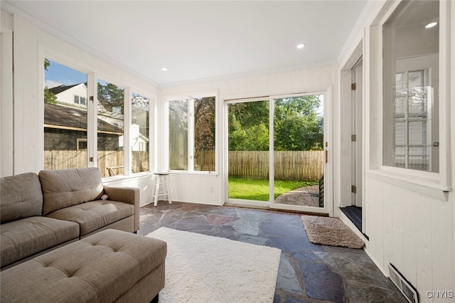 sunroom / solarium featuring a wealth of natural light