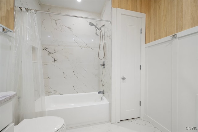 bathroom featuring shower / bath combo and toilet