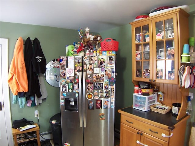 kitchen with stainless steel fridge with ice dispenser