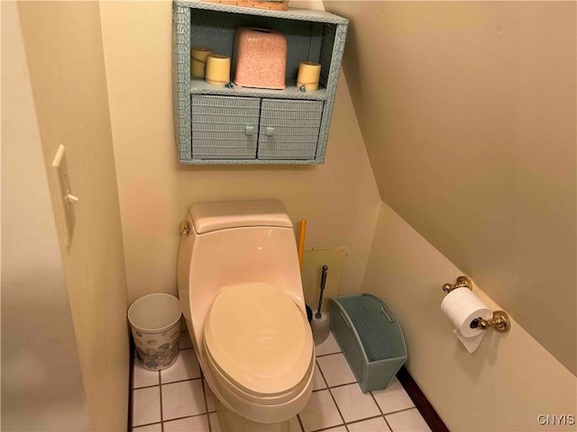 bathroom with tile patterned flooring and toilet