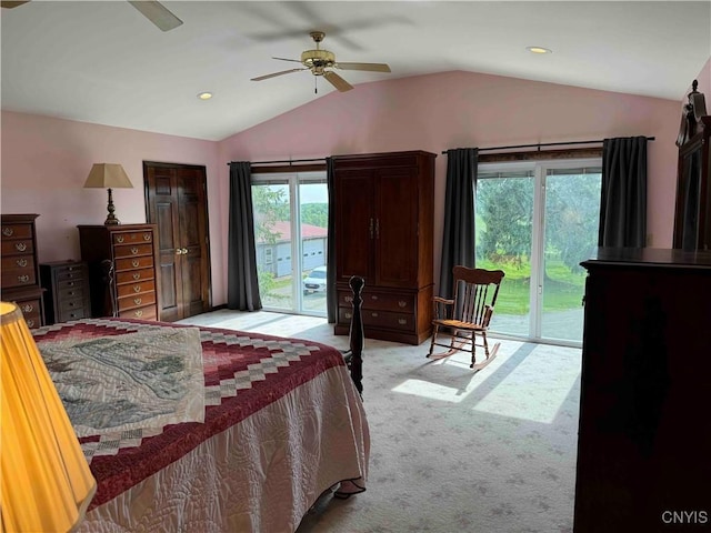 bedroom with light colored carpet, multiple windows, access to outside, and vaulted ceiling