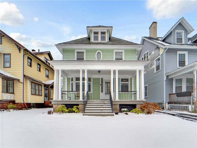 view of front of home featuring covered porch