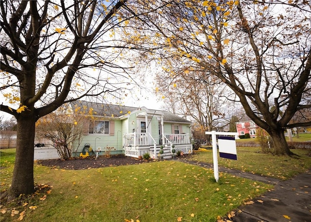 view of front of home with a front yard