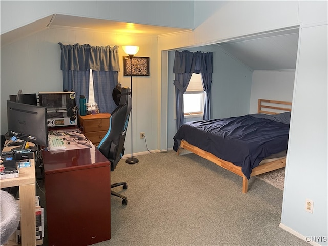 carpeted bedroom featuring lofted ceiling