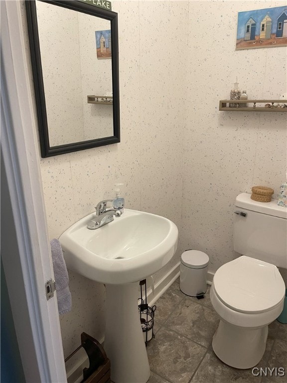 bathroom featuring toilet