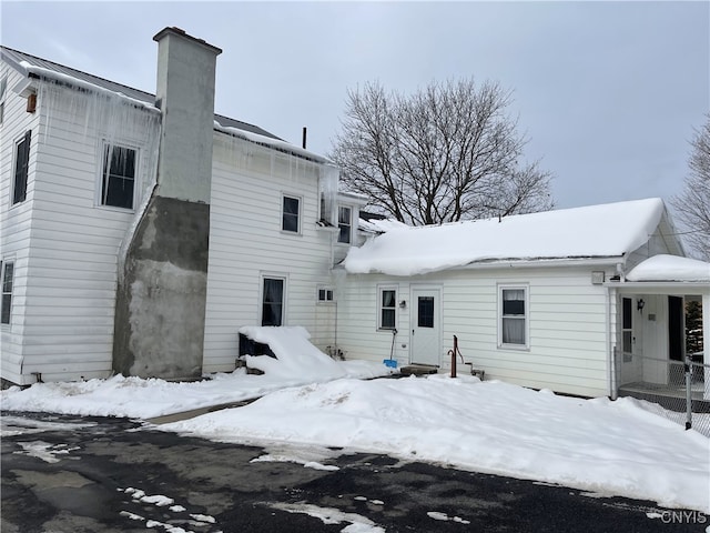 view of snow covered property