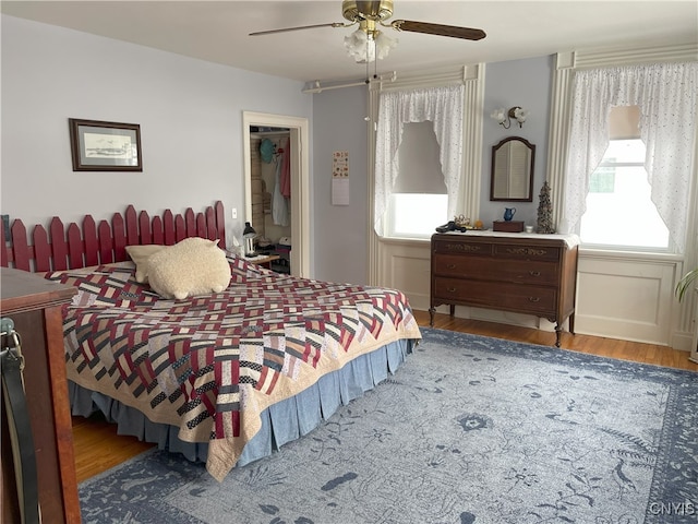 bedroom featuring ceiling fan and hardwood / wood-style floors