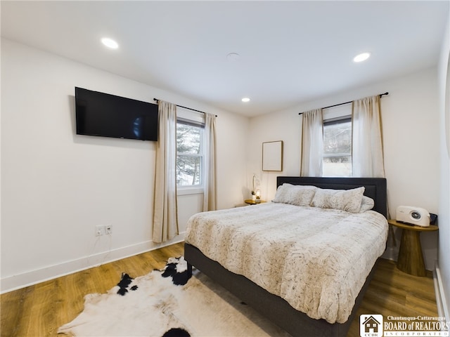 bedroom featuring hardwood / wood-style floors