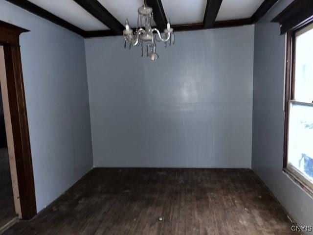 unfurnished dining area featuring beam ceiling, dark hardwood / wood-style flooring, and an inviting chandelier