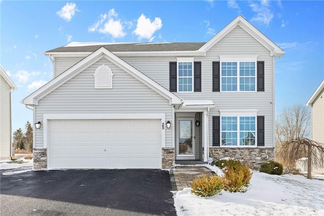 view of front of property featuring a garage