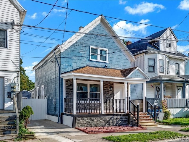 view of front of property featuring covered porch