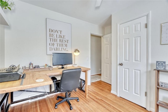 office area with light wood-type flooring