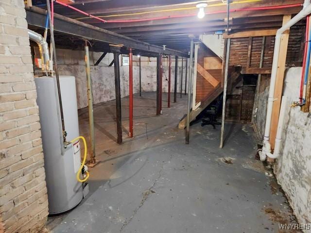 basement featuring gas water heater