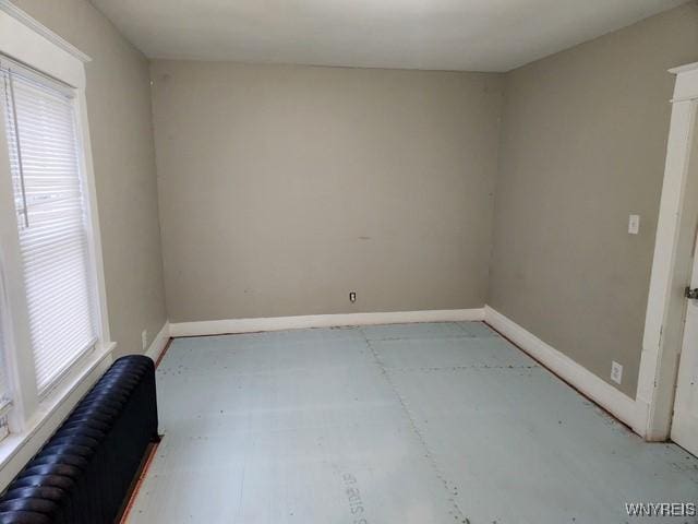 unfurnished room with radiator