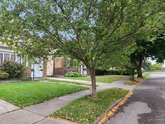 view of front of property with a front lawn