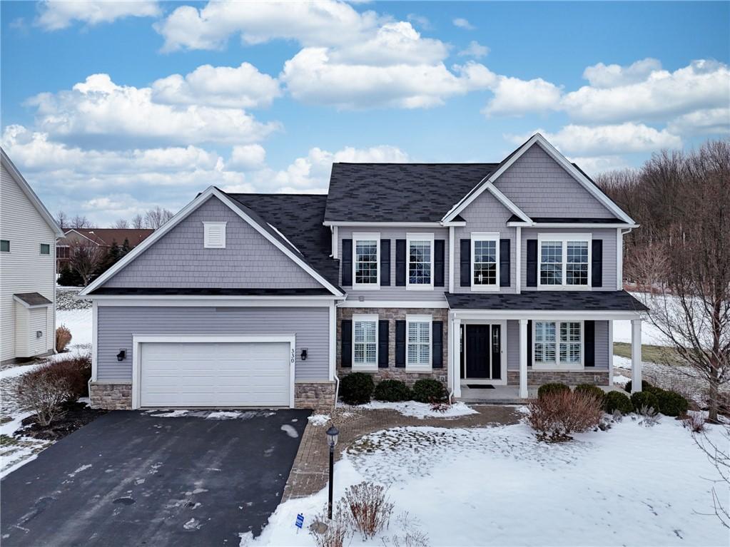 view of front of home with a garage