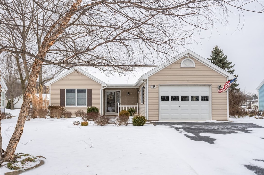 ranch-style home with a garage