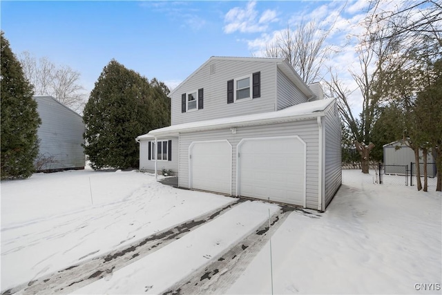 view of snow covered garage