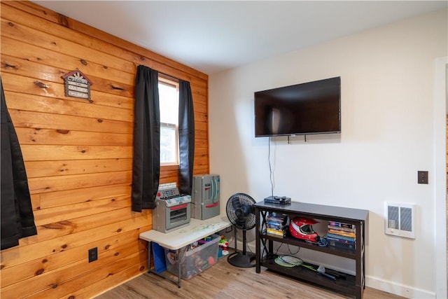 9539 Bronson Rd, Dansville, NY 14572 - living room with light wood-type flooring and wooden walls