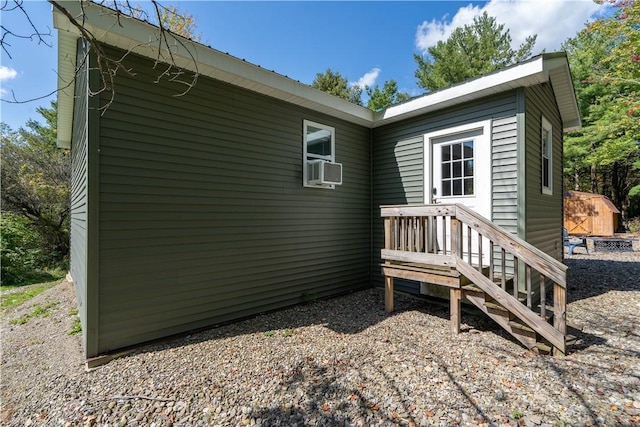 9539 Bronson Rd, Dansville, NY 14572 - view of side of home with cooling unit