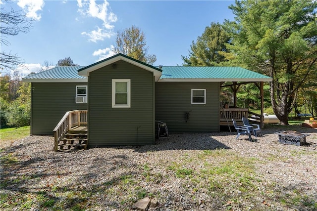 9539 Bronson Rd, Dansville, NY 14572 - back of property with an outdoor fire pit