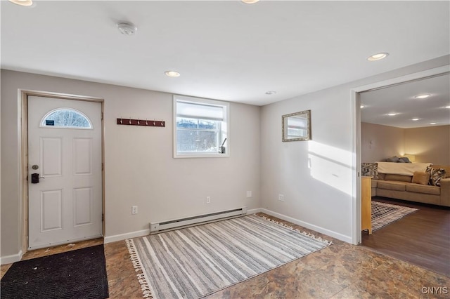 entryway featuring a baseboard heating unit