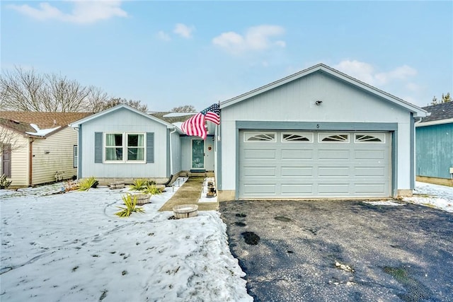 single story home with a garage