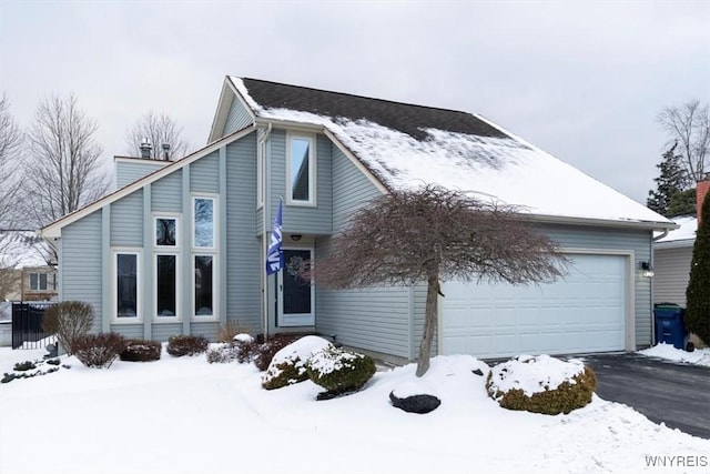 view of front of property with a garage