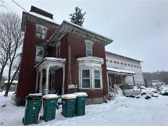 view of snow covered property