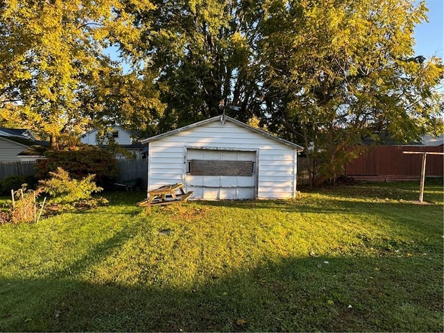 garage featuring a yard