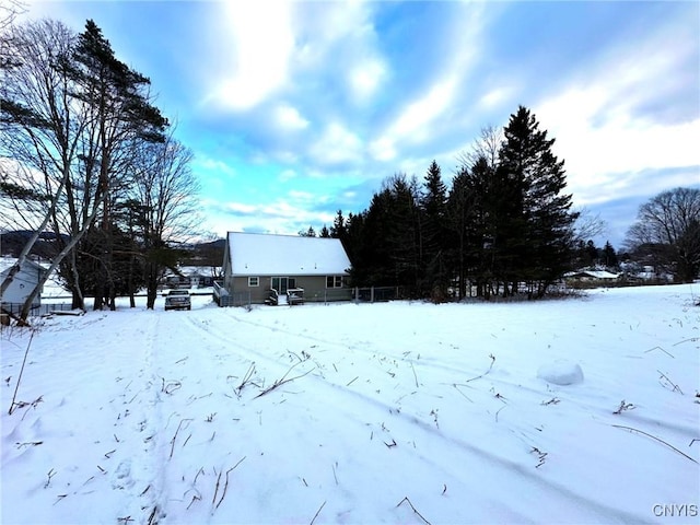 view of yard covered in snow