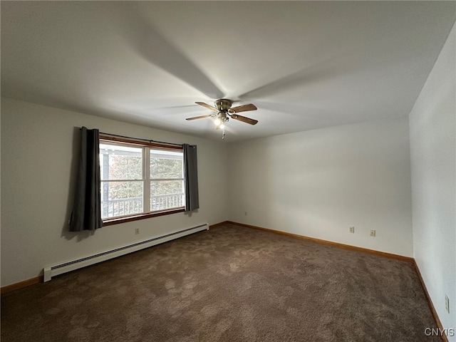 carpeted spare room with ceiling fan and a baseboard radiator